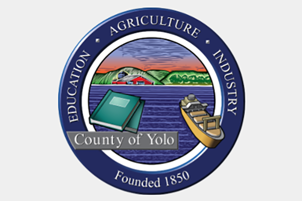 A blue circle with the words county of yolo on it.